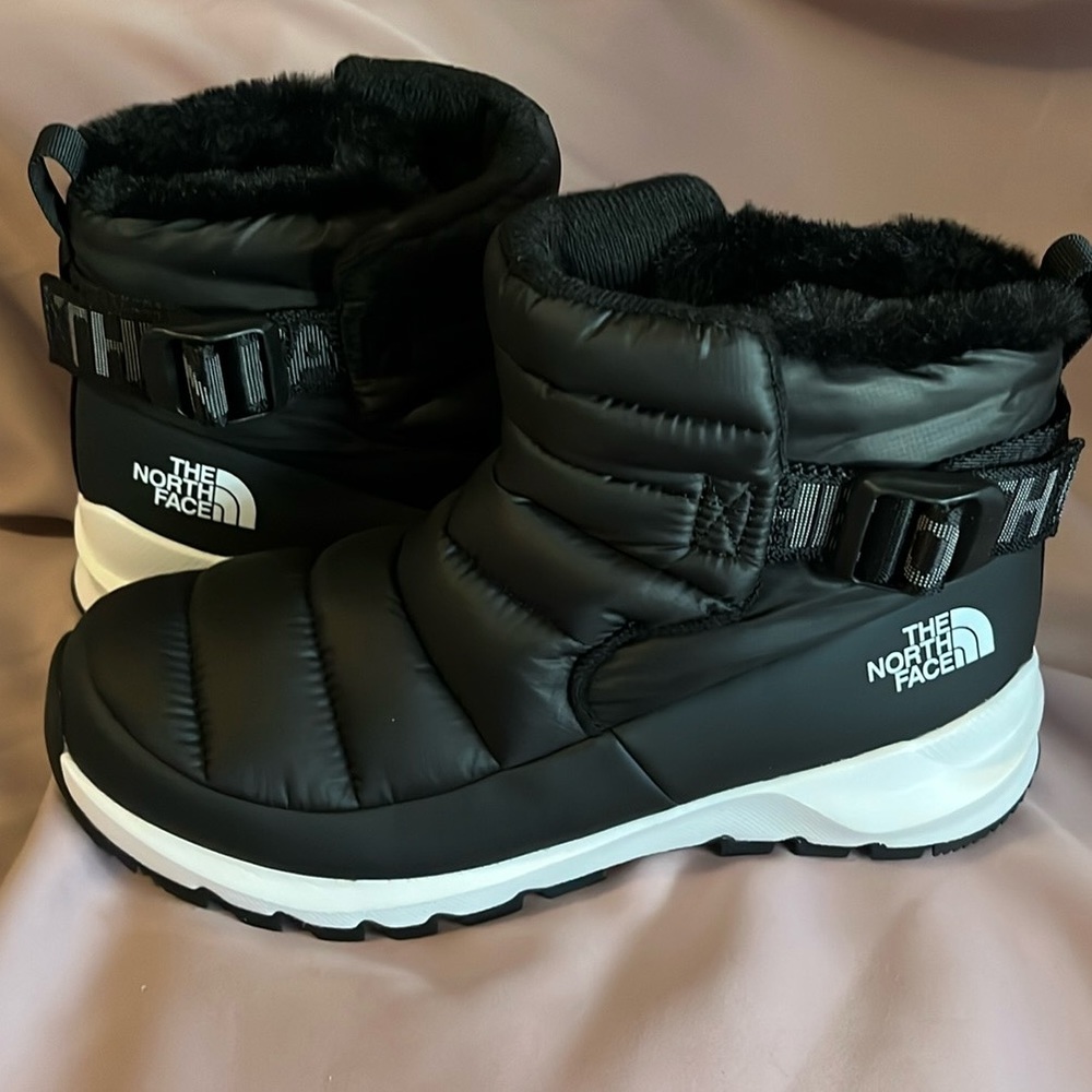 The North Face black winter snow boots